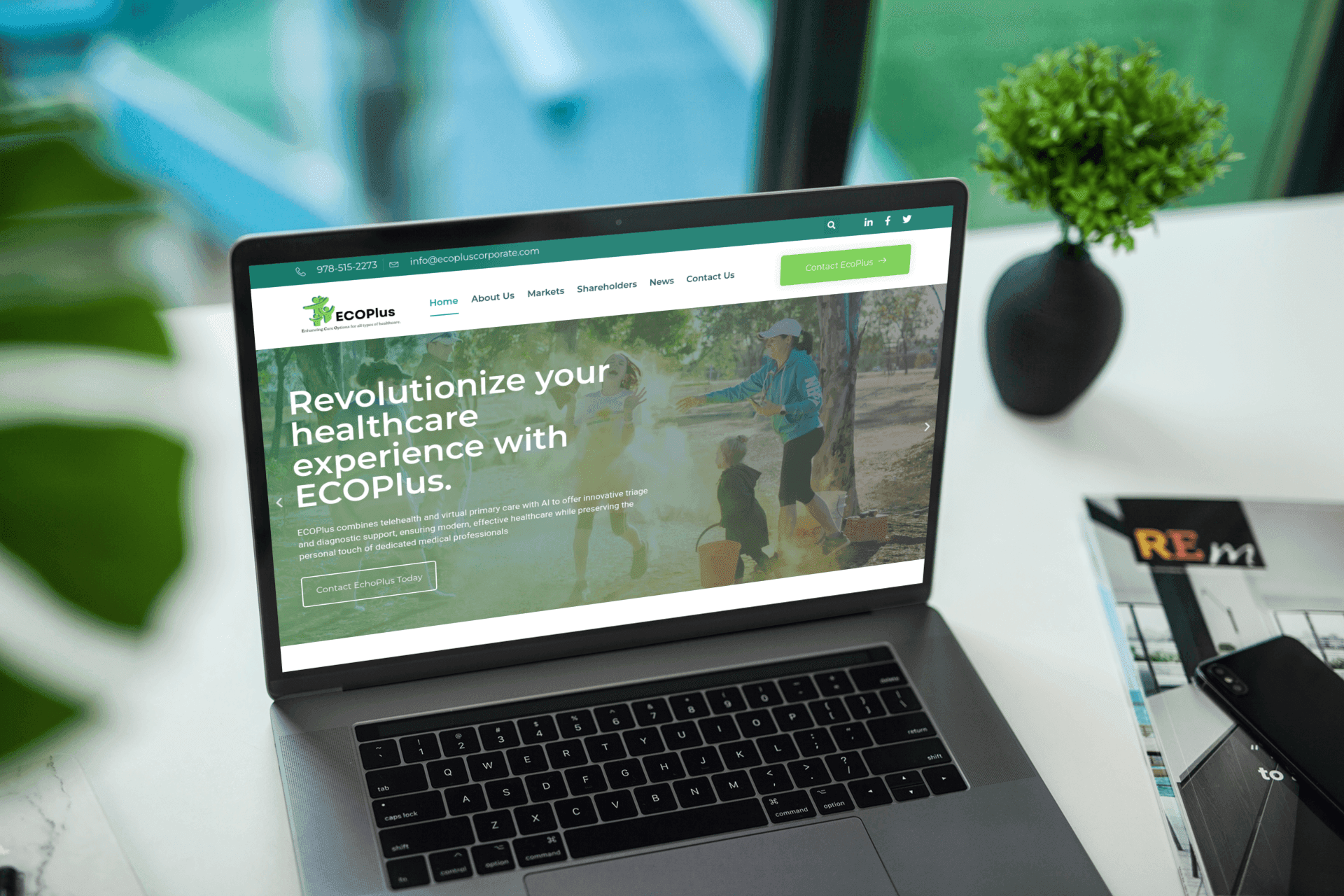 EcoPlus healthcare website displayed on a laptop